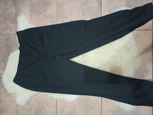 Pantalón de vestir tipo calza amplio 